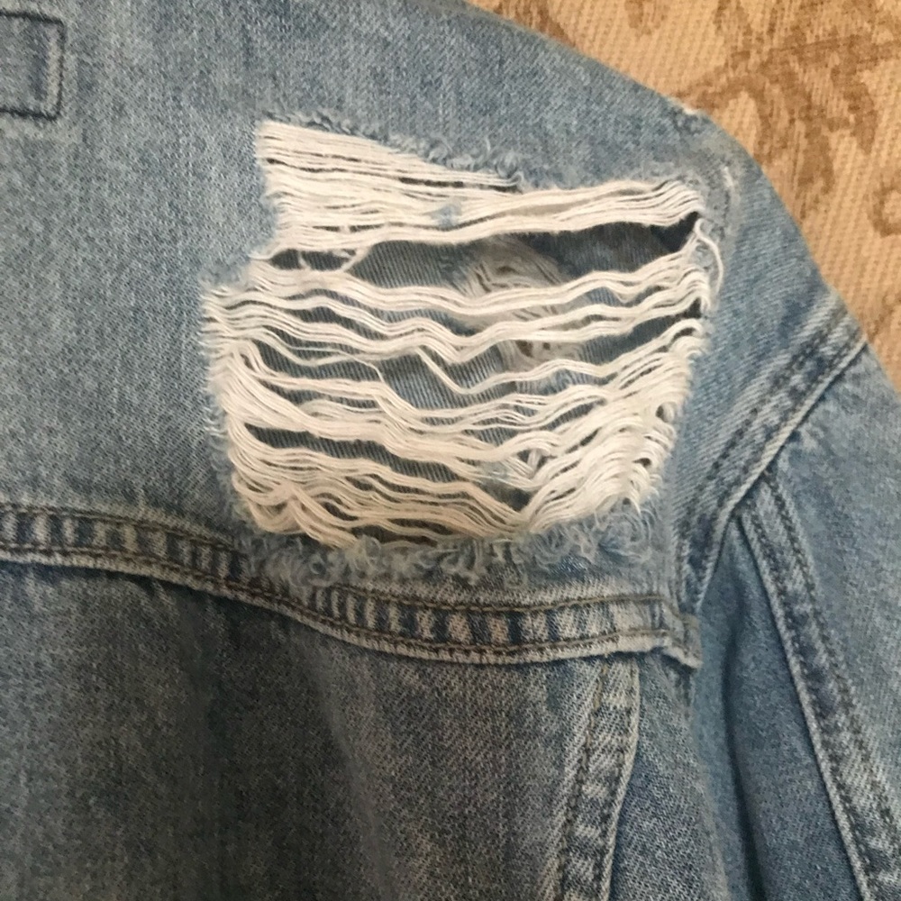 Distressed jean jacket, lots of rips and vintage looking. Comfy too - Picture 4 of 7